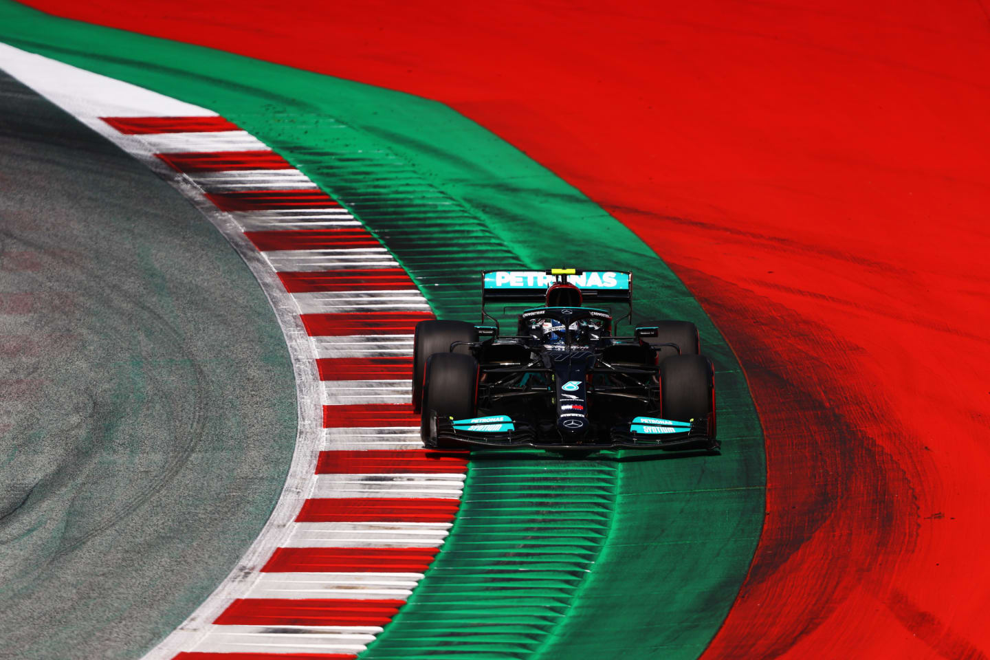 SPIELBERG, AUSTRIA - JULY 03: Valtteri Bottas of Finland driving the (77) Mercedes AMG Petronas F1 Team Mercedes W12 during qualifying ahead of the F1 Grand Prix of Austria at Red Bull Ring on July 03, 2021 in Spielberg, Austria. (Photo by Bryn Lennon/Getty Images)