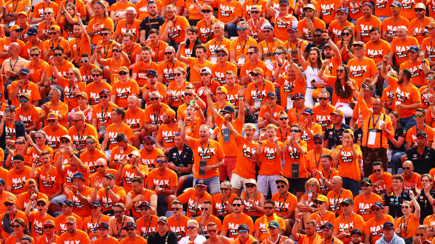 SPIELBERG, AUSTRIA - JULY 04: Max Verstappen of Netherlands and Red Bull Racing fans show their