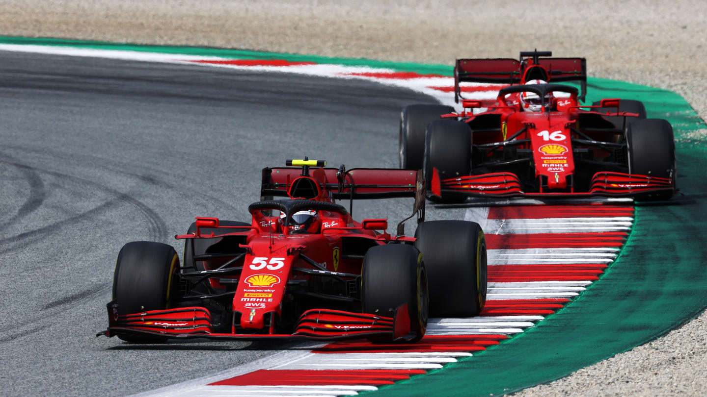 SPIELBERG, AUSTRIA - JULY 04: Carlos Sainz of Spain driving the (55) Scuderia Ferrari SF21 leads