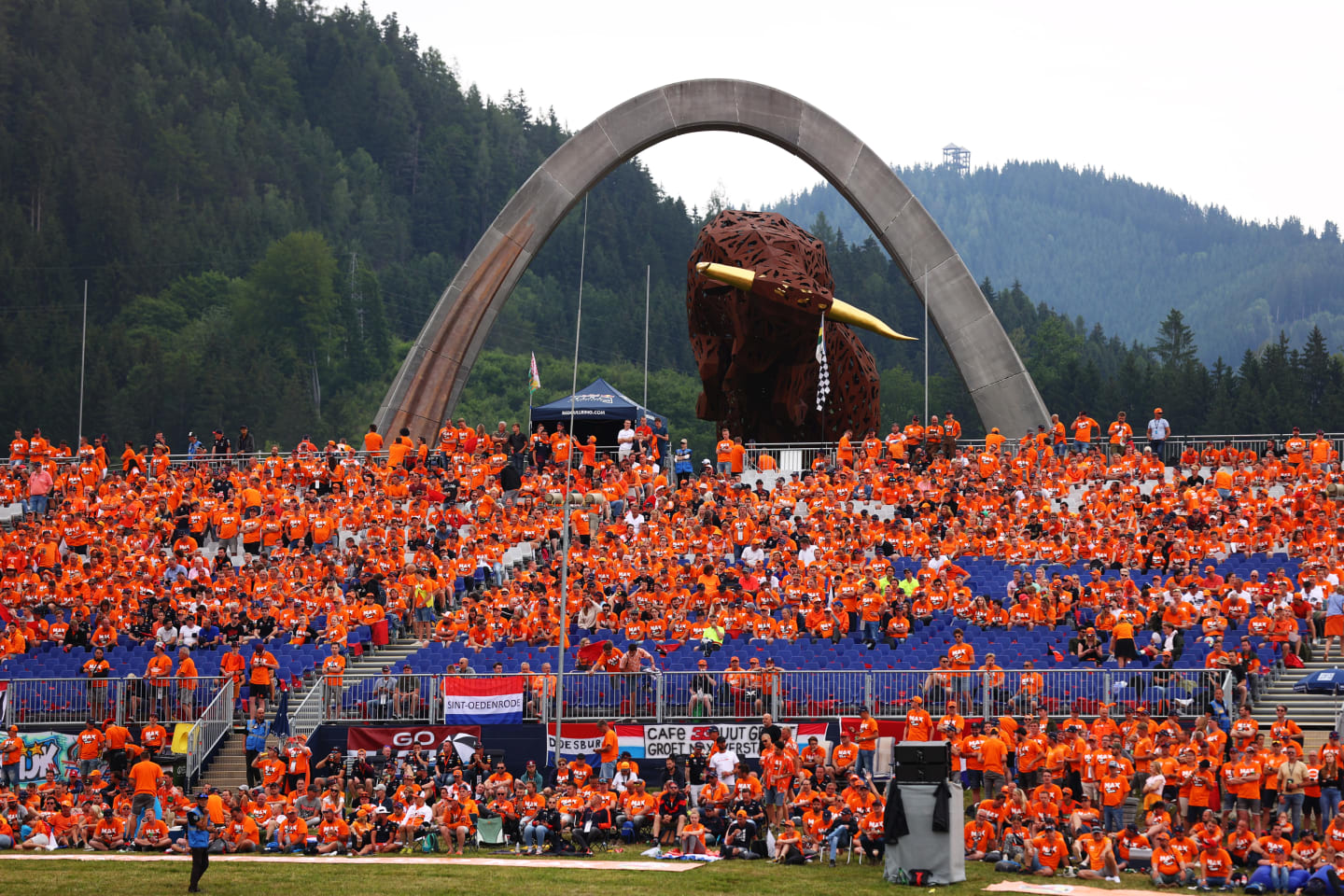 SPIELBERG, AUSTRIA - JULY 04: Max Verstappen of Netherlands and Red Bull Racing fans show their
