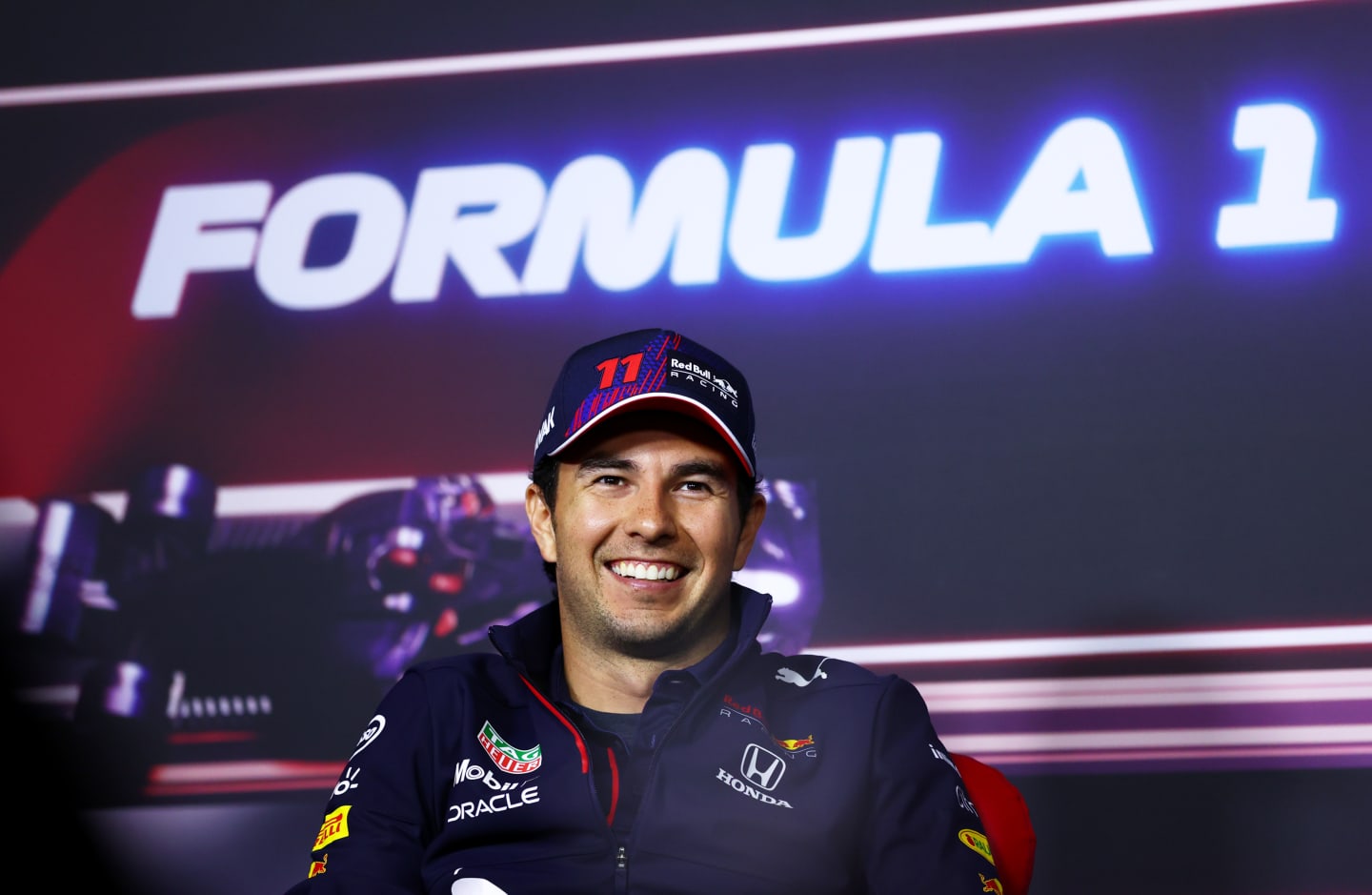 SPIELBERG, AUSTRIA - JULY 01: Sergio Perez of Mexico and Red Bull Racing looks on in the Drivers