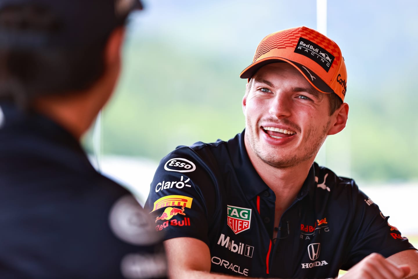 SPIELBERG, AUSTRIA - JULY 01: Max Verstappen of Netherlands and Red Bull Racing talks in the