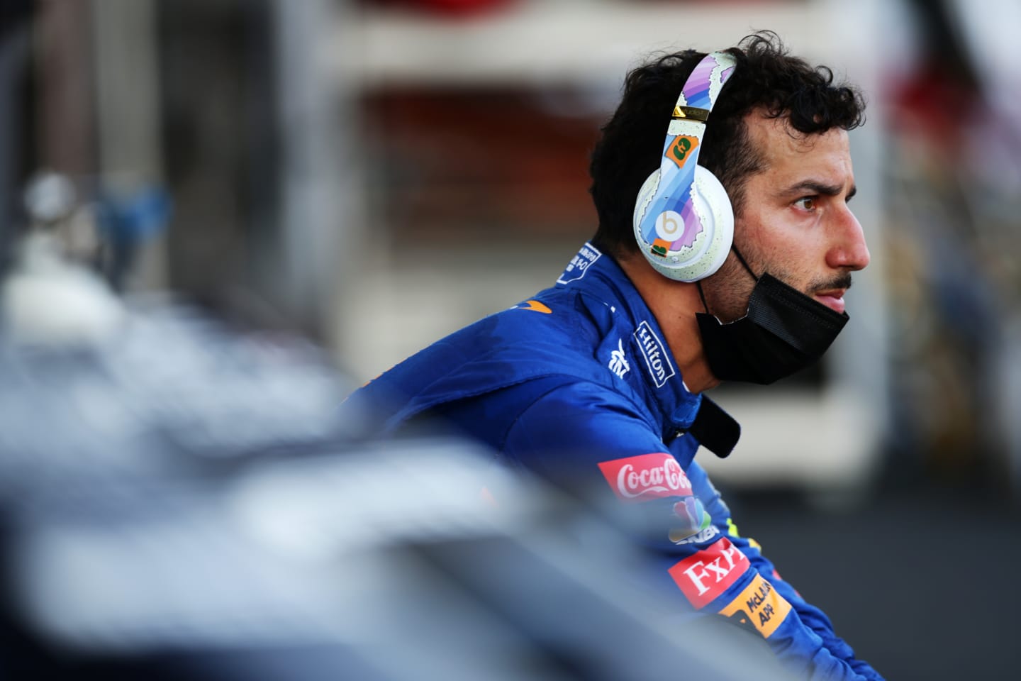 BAKU, AZERBAIJAN - JUNE 06: Daniel Ricciardo of Australia and McLaren F1 looks on from the pitlane during a red flag period during the F1 Grand Prix of Azerbaijan at Baku City Circuit on June 06, 2021 in Baku, Azerbaijan. (Photo by Peter Fox/Getty Images)