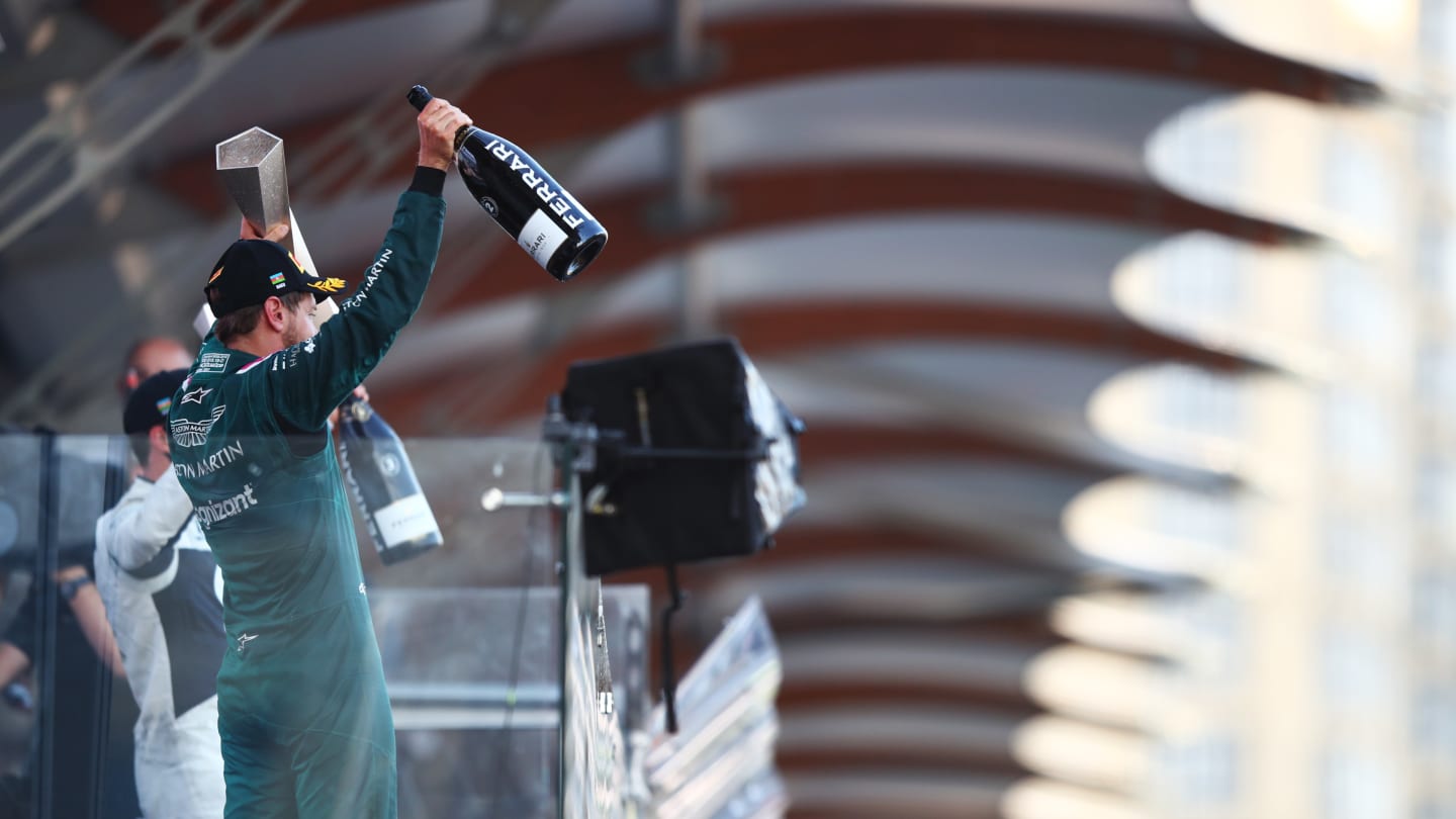 BAKU, AZERBAIJAN - JUNE 06: Second placed Sebastian Vettel of Germany and Aston Martin F1 Team celebrates on the podium during the F1 Grand Prix of Azerbaijan at Baku City Circuit on June 06, 2021 in Baku, Azerbaijan. (Photo by Joe Portlock - Formula 1/Formula 1 via Getty Images)