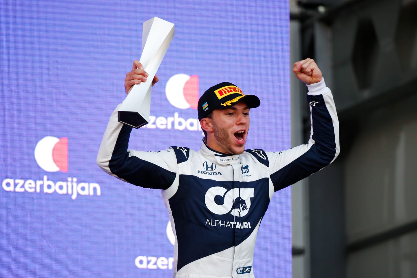 BAKU, AZERBAIJAN - JUNE 06: Third placed Pierre Gasly of France and Scuderia AlphaTauri celebrates on the podium during the F1 Grand Prix of Azerbaijan at Baku City Circuit on June 06, 2021 in Baku, Azerbaijan. (Photo by Maxim Shemetov - Pool/Getty Images)