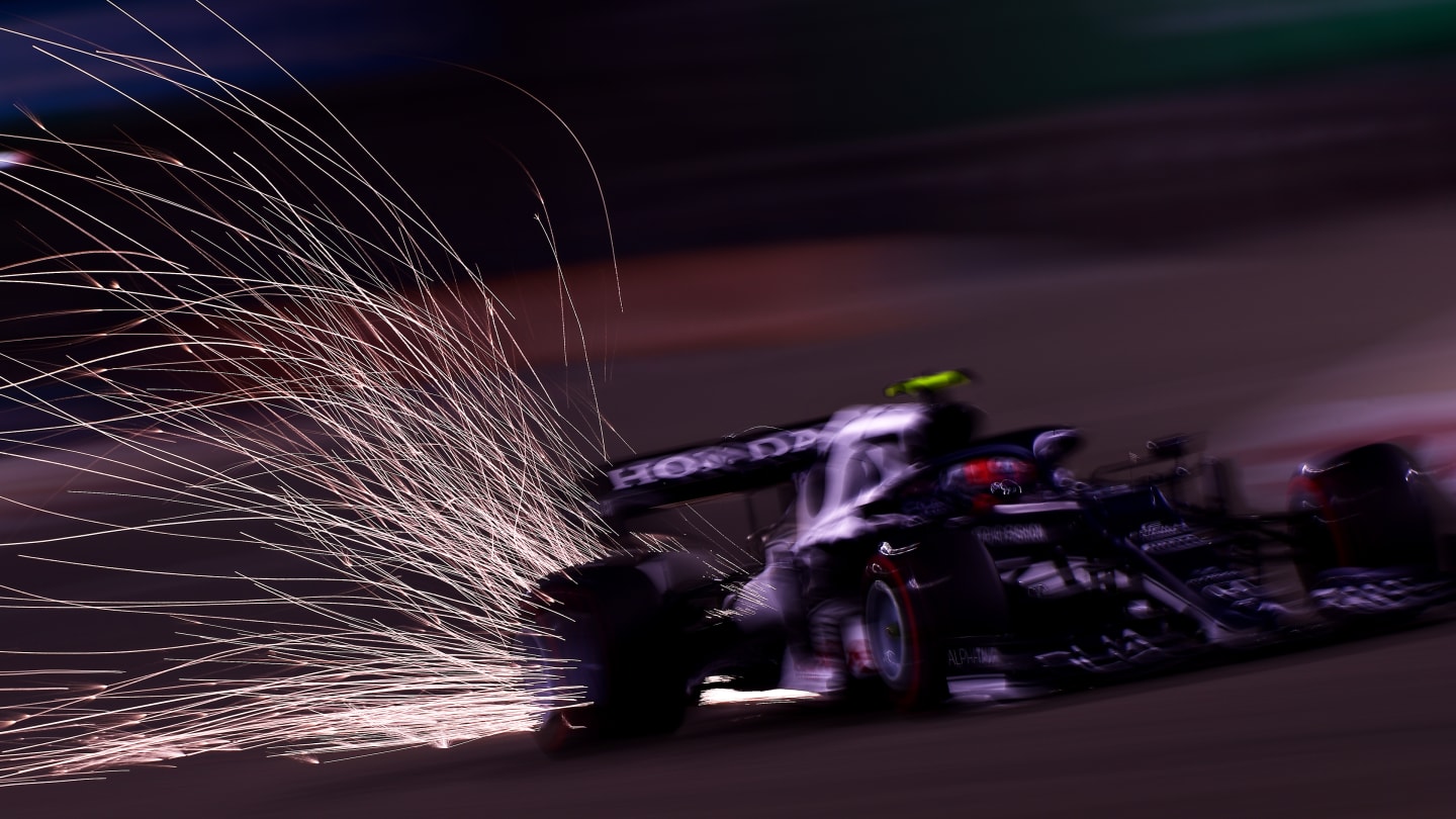 BAHRAIN, BAHRAIN - MARCH 26: Sparks fly behind Pierre Gasly of France driving the (10) Scuderia AlphaTauri AT02 Honda on track during practice ahead of the F1 Grand Prix of Bahrain at Bahrain International Circuit on March 26, 2021 in Bahrain, Bahrain. (Photo by Mario Renzi - Formula 1/Formula 1 via Getty Images)