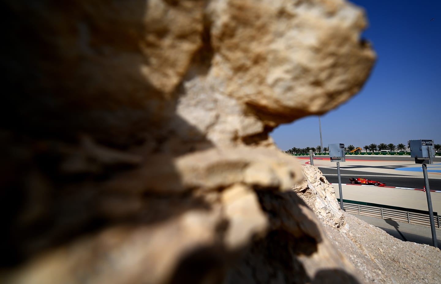 BAHRAIN, BAHRAIN - MARCH 26: Charles Leclerc of Monaco driving the (16) Scuderia Ferrari SF21 drives on track during practice ahead of the F1 Grand Prix of Bahrain at Bahrain International Circuit on March 26, 2021 in Bahrain, Bahrain. (Photo by Clive Mason - Formula 1/Formula 1 via Getty Images)