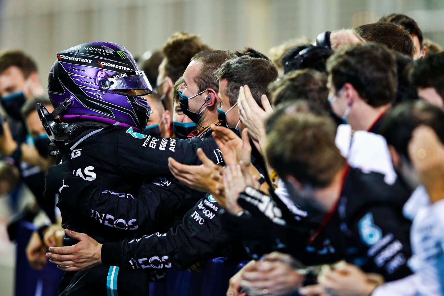 BAHRAIN, BAHRAIN - MARCH 28: Race winner Lewis Hamilton of Great Britain and Mercedes GP celebrates