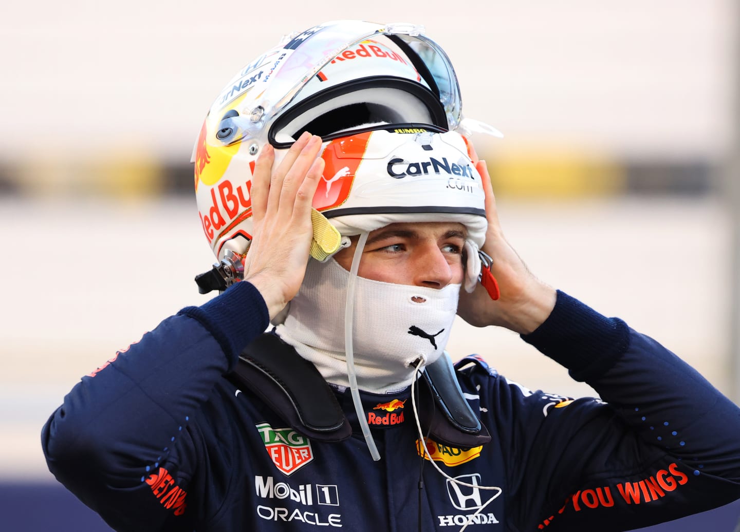 BAHRAIN, BAHRAIN - MARCH 28: Max Verstappen of Netherlands and Red Bull Racing puts his helmet on