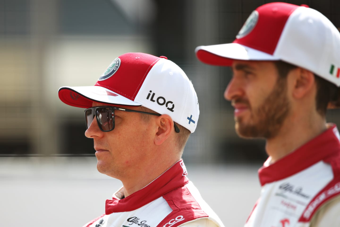 BAHRAIN, BAHRAIN - MARCH 12: Antonio Giovinazzi of Italy and Alfa Romeo Racing and Kimi Raikkonen