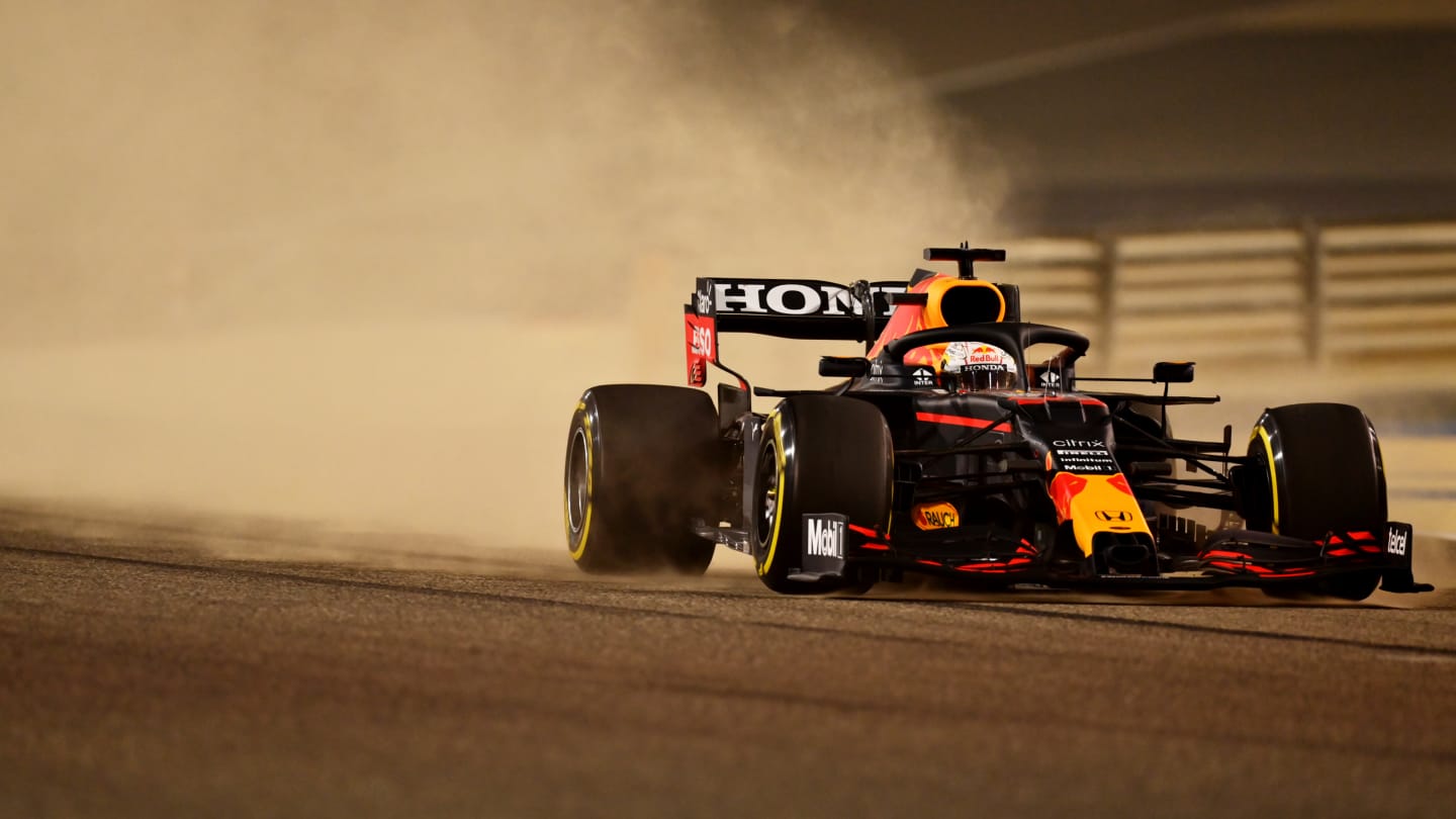BAHRAIN, BAHRAIN - MARCH 12: Max Verstappen of the Netherlands driving the (33) Red Bull Racing RB16B Honda kicks up sand during Day One of F1 Testing at Bahrain International Circuit on March 12, 2021 in Bahrain, Bahrain. (Photo by Clive Mason - Formula 1/Formula 1 via Getty Images)
