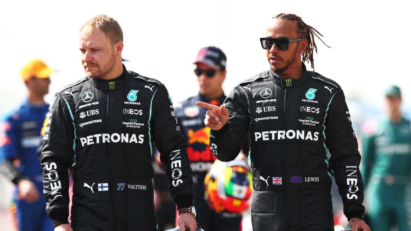 BAHRAIN, BAHRAIN - MARCH 12: Valtteri Bottas of Finland and Mercedes GP and teammate Lewis Hamilton