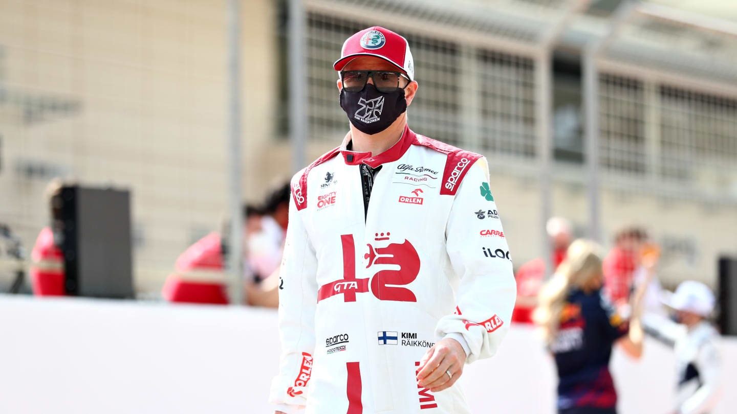 BAHRAIN, BAHRAIN - MARCH 12: Kimi Raikkonen of Finland and Alfa Romeo Racing looks on from the grid