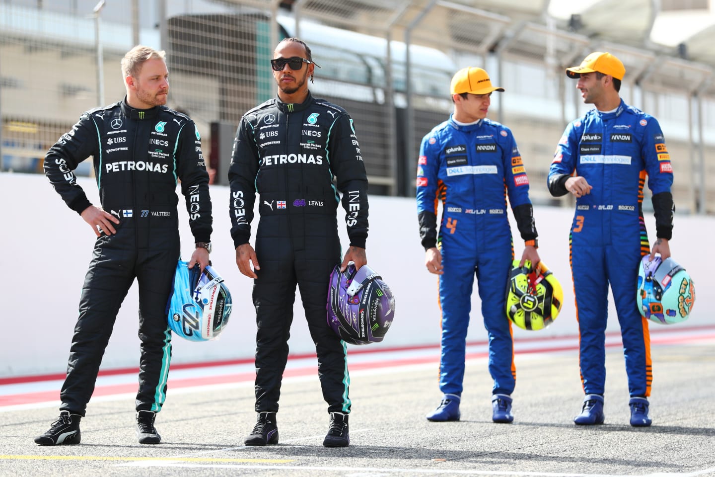 BAHRAIN, BAHRAIN - MARCH 12:  Valtteri Bottas of Finland and Mercedes GP, Lewis Hamilton of Great