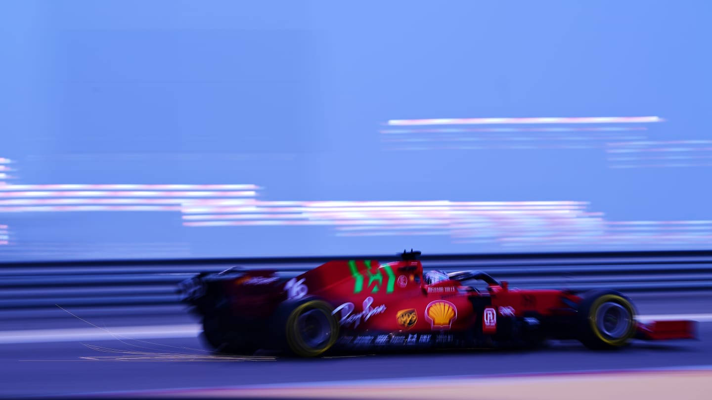 Leclerc's Ferrari contrasts with the Sakhir sky in the evening