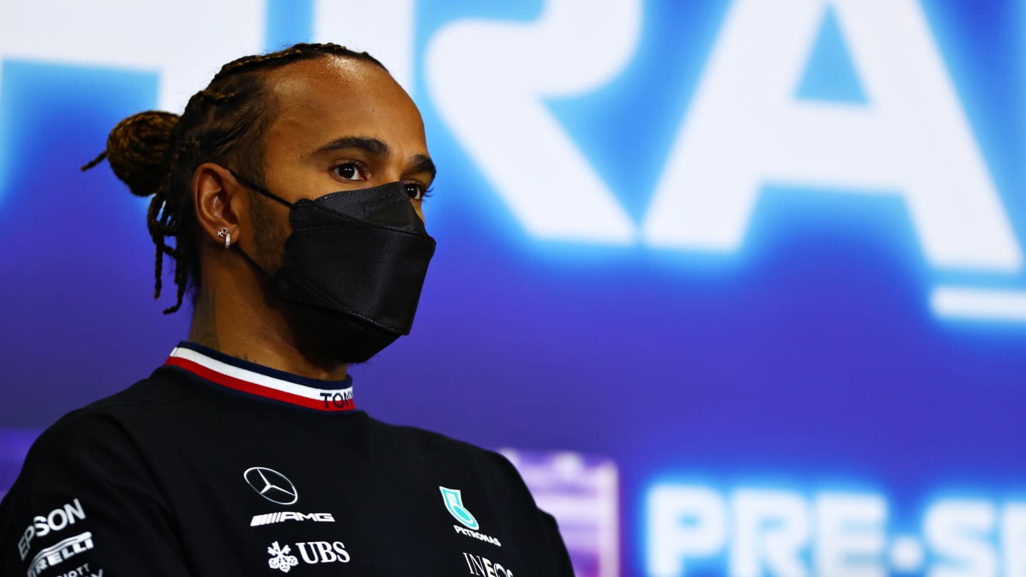 BAHRAIN, BAHRAIN - MARCH 14: Lewis Hamilton of Great Britain and Mercedes GP talks in a press