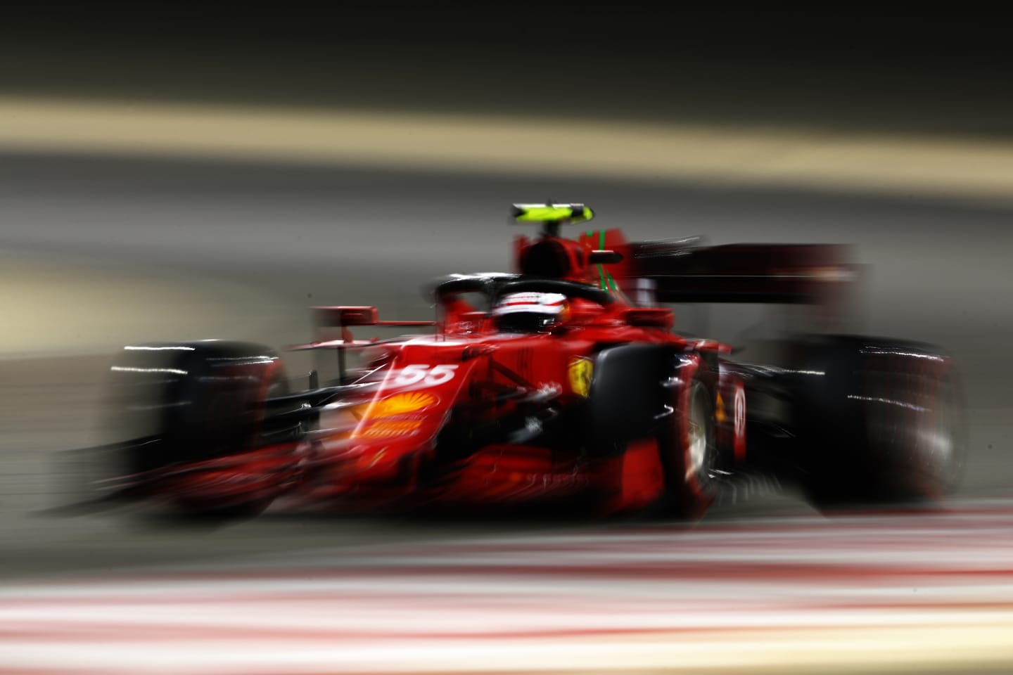 BAHRAIN, BAHRAIN - MARCH 14: Carlos Sainz of Spain driving the (55) Scuderia Ferrari SF21 on track