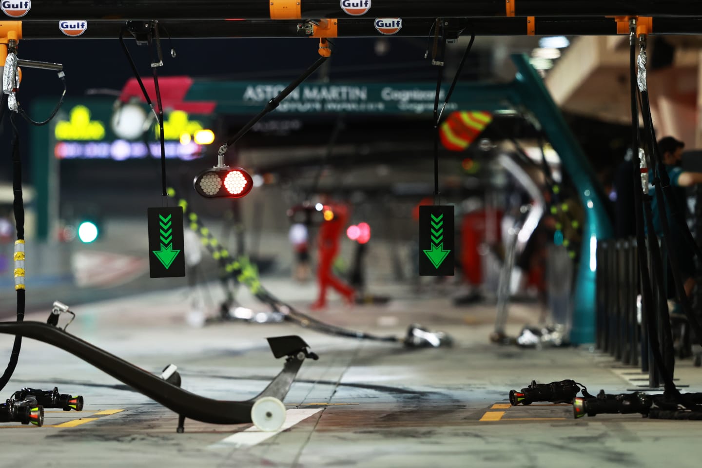 The McLaren F1 garage primed for action under the lights