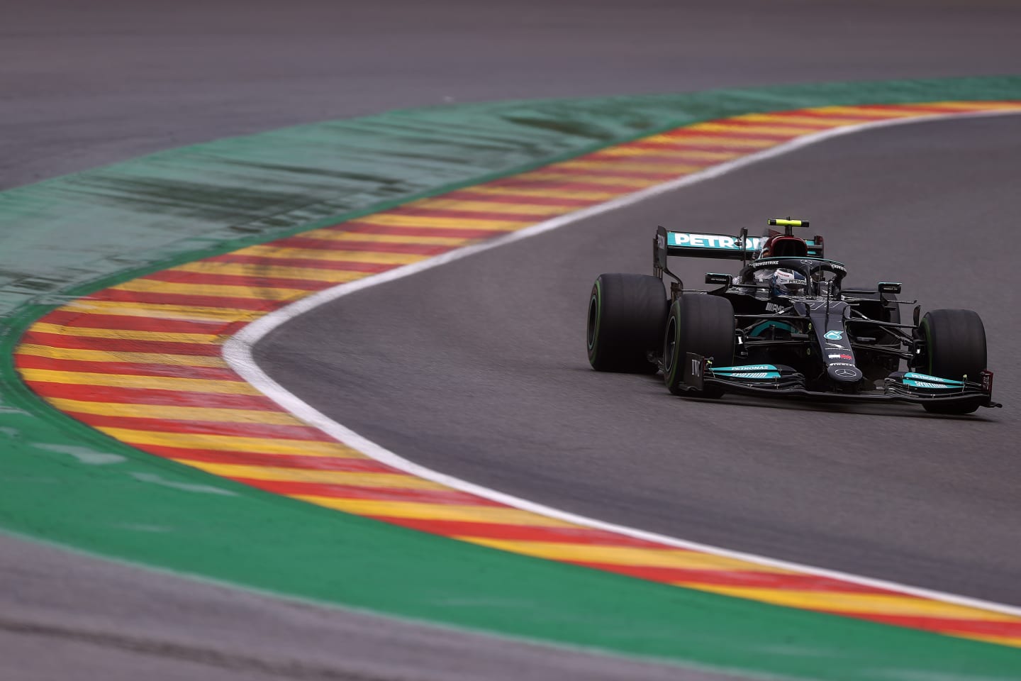 SPA, BELGIUM - AUGUST 28: Valtteri Bottas of Finland driving the (77) Mercedes AMG Petronas F1 Team Mercedes W12 during qualifying ahead of the F1 Grand Prix of Belgium at Circuit de Spa-Francorchamps on August 28, 2021 in Spa, Belgium. (Photo by Lars Baron/Getty Images)