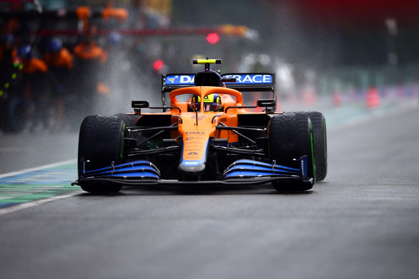 SPA, BELGIUM - AUGUST 28: Lando Norris of Great Britain driving the (4) McLaren F1 Team MCL35M Mercedes in the Pitlane during qualifying ahead of the F1 Grand Prix of Belgium at Circuit de Spa-Francorchamps on August 28, 2021 in Spa, Belgium. (Photo by Peter Fox/Getty Images)