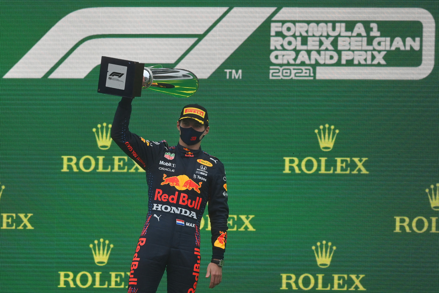 SPA, BELGIUM - AUGUST 29: Race winner Max Verstappen of Netherlands and Red Bull Racing celebrates on the podium during the F1 Grand Prix of Belgium at Circuit de Spa-Francorchamps on August 29, 2021 in Spa, Belgium. (Photo by Dan Mullan/Getty Images)