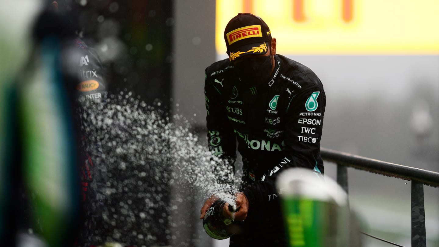SPA, BELGIUM - AUGUST 29: Third placed Lewis Hamilton of Great Britain and Mercedes GP celebrates on the podium during the F1 Grand Prix of Belgium at Circuit de Spa-Francorchamps on August 29, 2021 in Spa, Belgium. (Photo by Mario Renzi - Formula 1/Formula 1 via Getty Images)