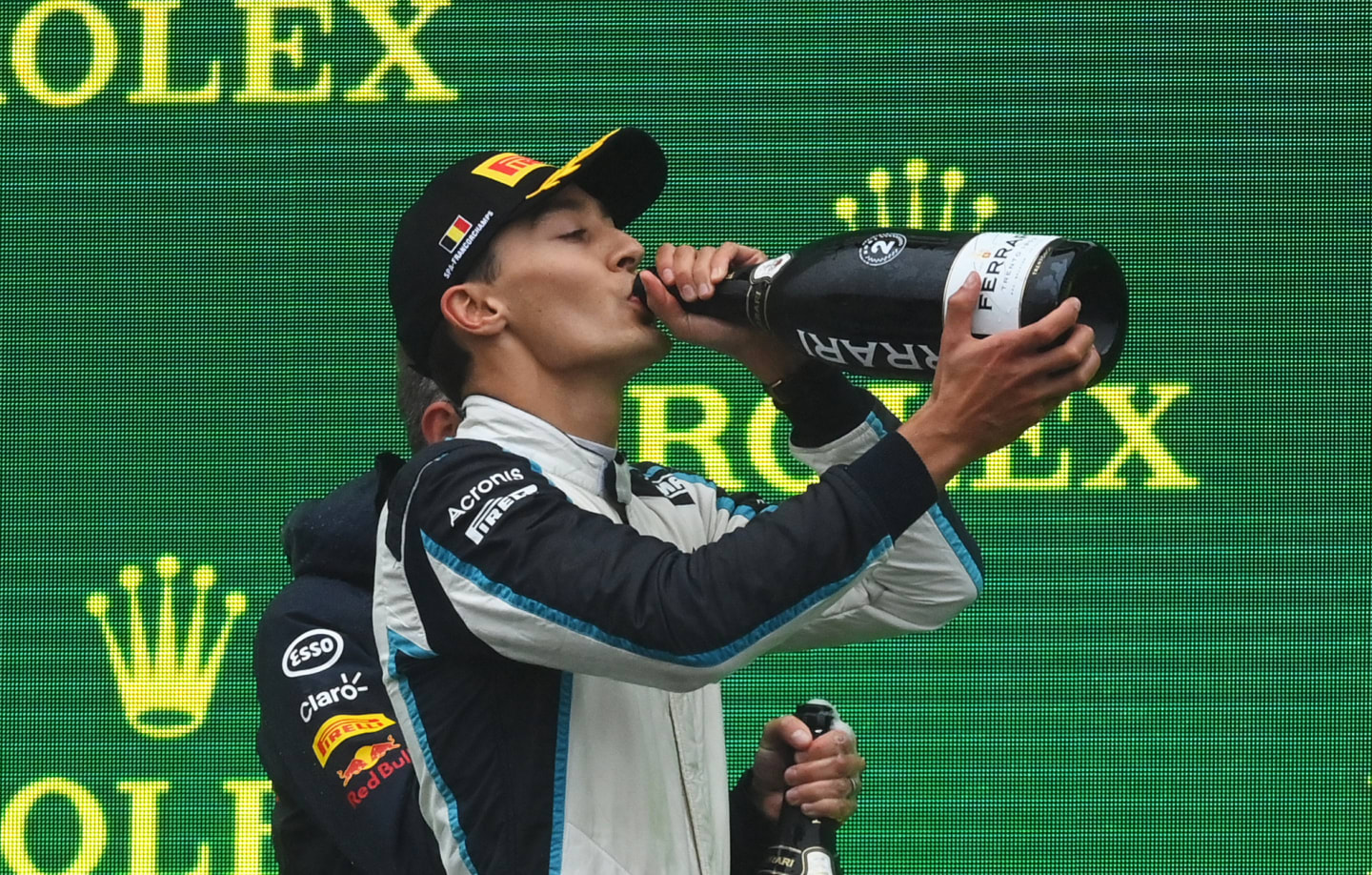 SPA, BELGIUM - AUGUST 29: Second placed George Russell of Great Britain and Williams celebrates on the podium during the F1 Grand Prix of Belgium at Circuit de Spa-Francorchamps on August 29, 2021 in Spa, Belgium. (Photo by Dan Mullan/Getty Images)