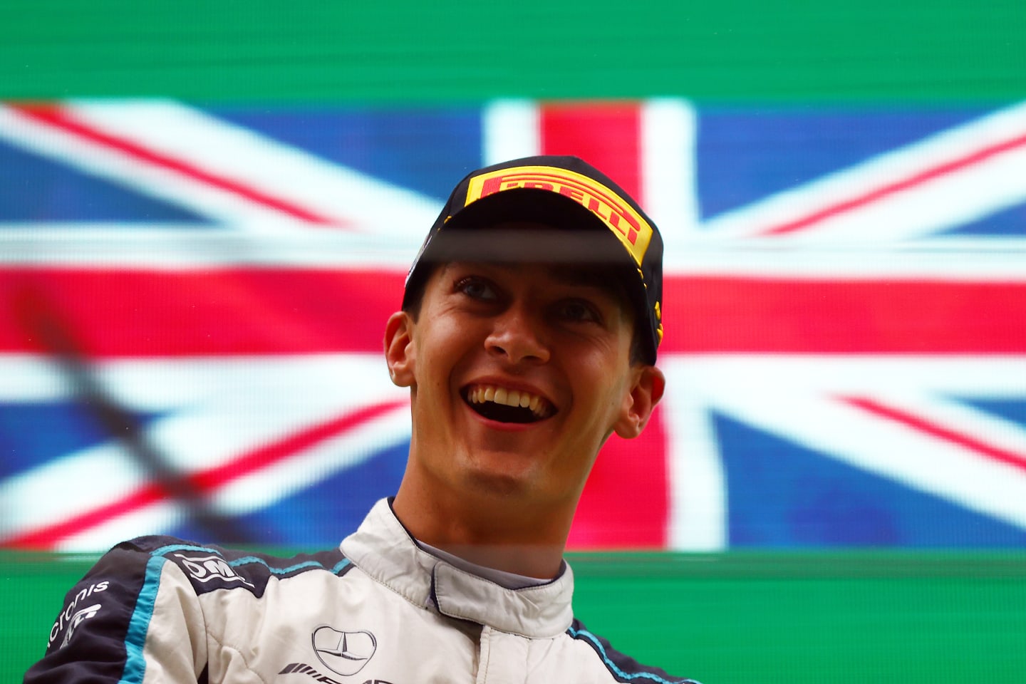 SPA, BELGIUM - AUGUST 29: Second placed George Russell of Great Britain and Williams celebrates on the podium during the F1 Grand Prix of Belgium at Circuit de Spa-Francorchamps on August 29, 2021 in Spa, Belgium. (Photo by Dan Istitene - Formula 1/Formula 1 via Getty Images)