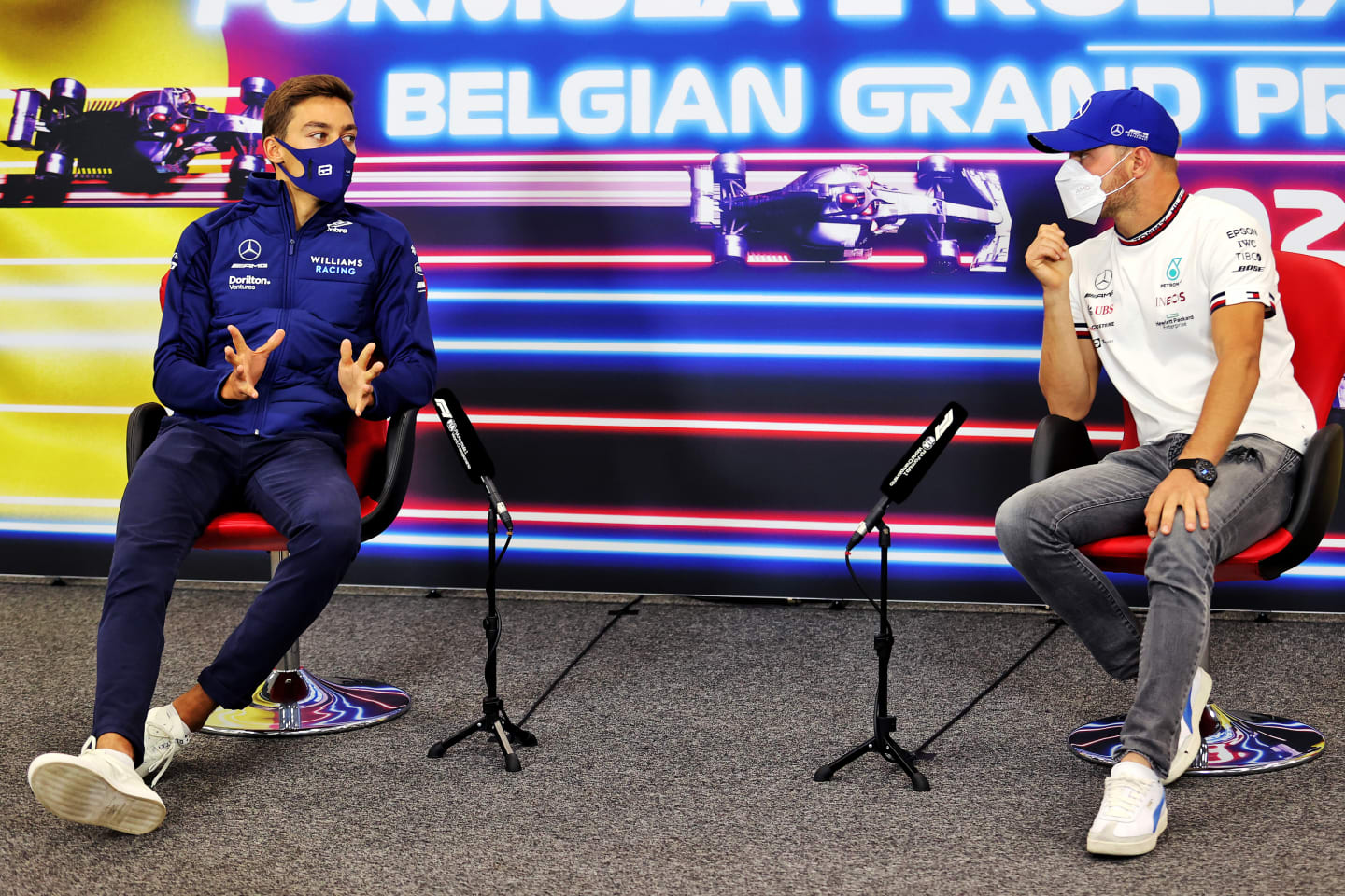 SPA, BELGIUM - AUGUST 26: George Russell of Great Britain and Williams and Valtteri Bottas of