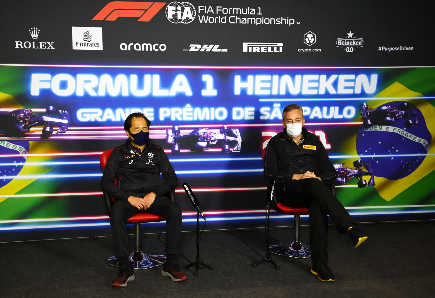 SAO PAULO, BRAZIL - NOVEMBER 12: Toyoharu Tanabe of Honda and Director of Pirelli F1 Mario Isola talk in the Team Principals Press Conference after practice ahead of the F1 Grand Prix of Brazil at Autodromo Jose Carlos Pace on November 12, 2021 in Sao Paulo, Brazil. (Photo by Clive Mason/Getty Images)