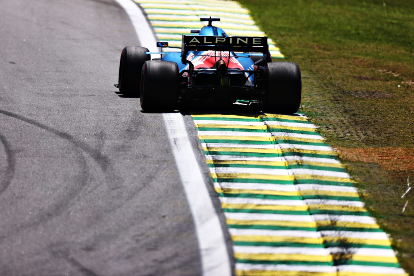 SAO PAULO, BRAZIL - NOVEMBER 13: Fernando Alonso of Spain driving the (14) Alpine A521 Renault during practice ahead of the F1 Grand Prix of Brazil at Autodromo Jose Carlos Pace on November 13, 2021 in Sao Paulo, Brazil. (Photo by Mark Thompson/Getty Images)