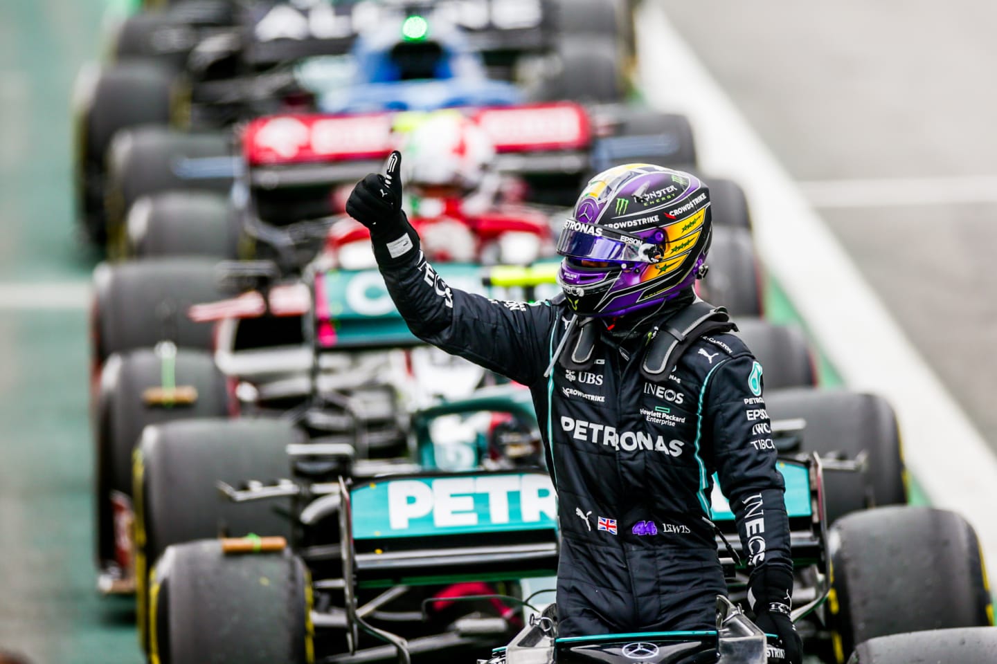 SAO PAULO, BRAZIL - NOVEMBER 13: Lewis Hamilton of Mercedes and Great Britain waves to the crowd