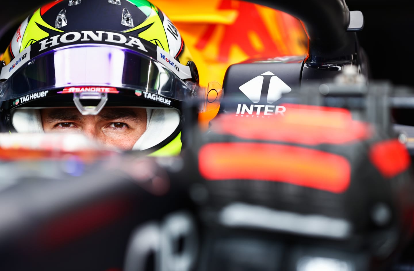 SAO PAULO, BRAZIL - NOVEMBER 13: Sergio Perez of Mexico and Red Bull Racing prepares to drive in the garage before the sprint ahead of the F1 Grand Prix of Brazil at Autodromo Jose Carlos Pace on November 13, 2021 in Sao Paulo, Brazil. (Photo by Mark Thompson/Getty Images)
