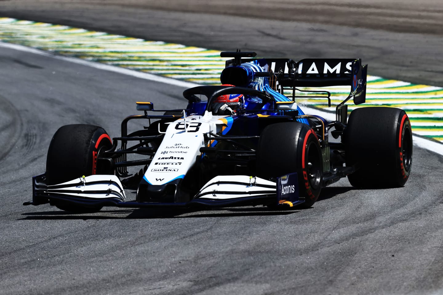 SAO PAULO, BRAZIL - NOVEMBER 14: George Russell of Great Britain driving the (63) Williams Racing FW43B Mercedes on his way to the grid before the F1 Grand Prix of Brazil at Autodromo Jose Carlos Pace on November 14, 2021 in Sao Paulo, Brazil. (Photo by Buda Mendes/Getty Images)