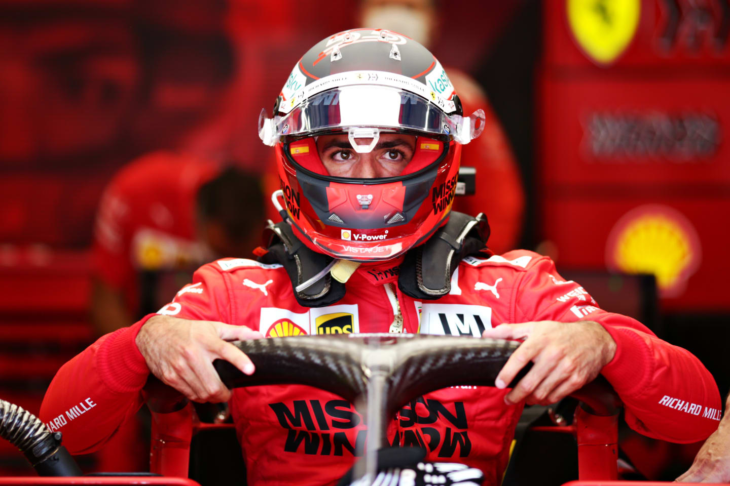 SAO PAULO, BRAZIL - NOVEMBER 14: Carlos Sainz of Spain and Ferrari prepares to drive in the garage before the F1 Grand Prix of Brazil at Autodromo Jose Carlos Pace on November 14, 2021 in Sao Paulo, Brazil. (Photo by Peter Fox/Getty Images)