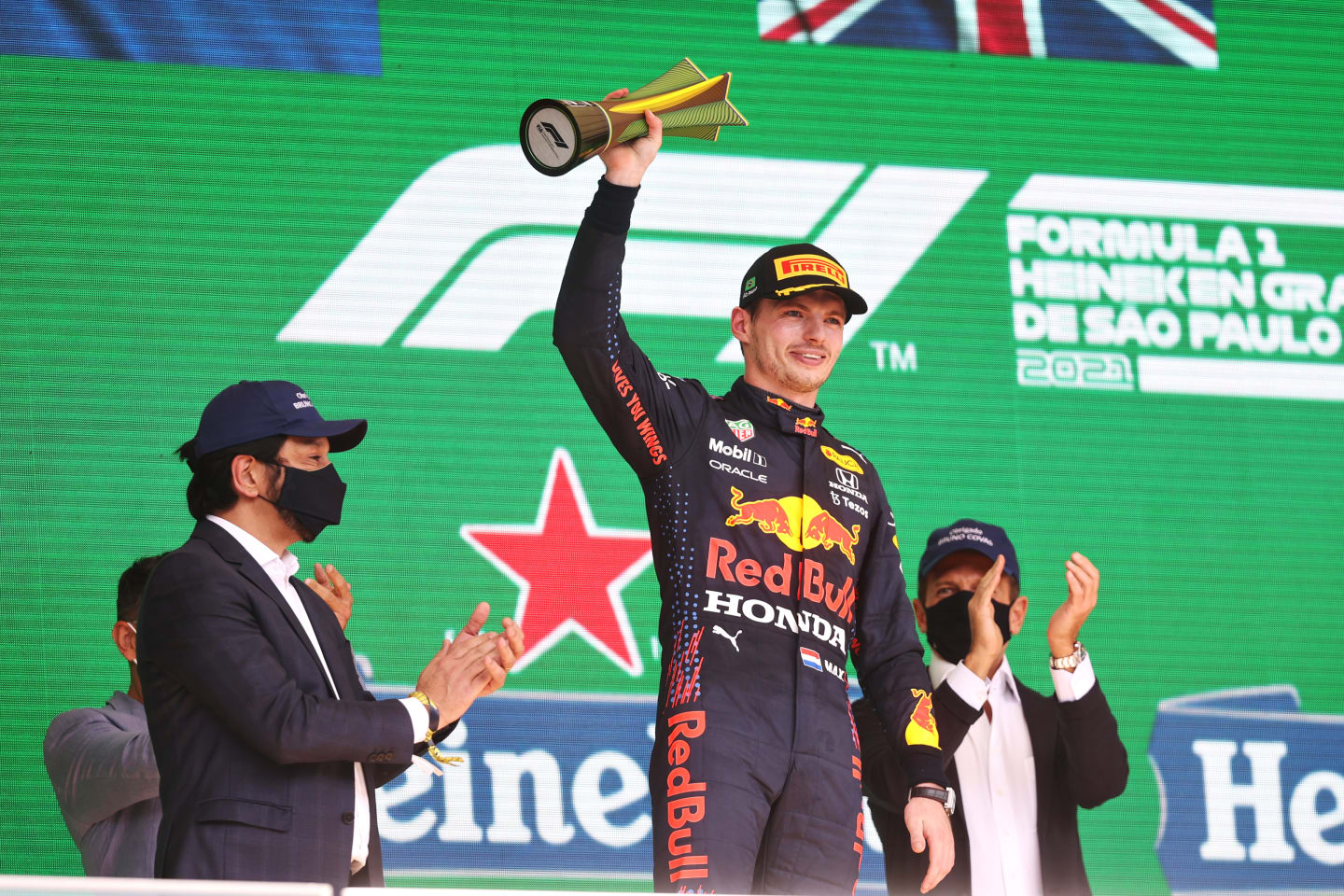 SAO PAULO, BRAZIL - NOVEMBER 14: Second placed Max Verstappen of Netherlands and Red Bull Racing celebrates on the podium during the F1 Grand Prix of Brazil at Autodromo Jose Carlos Pace on November 14, 2021 in Sao Paulo, Brazil. (Photo by Lars Baron/Getty Images)