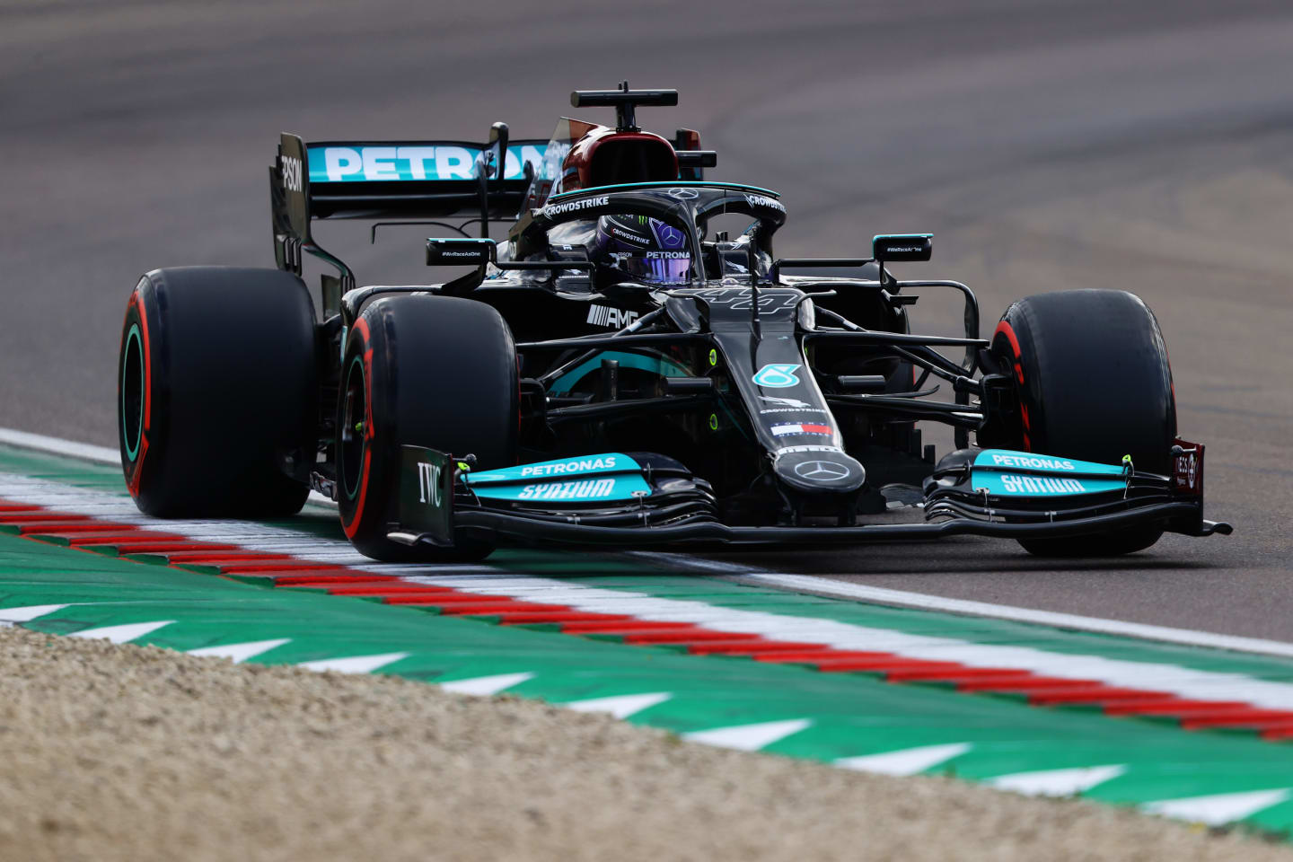 IMOLA, ITALY - APRIL 17: Lewis Hamilton of Great Britain driving the (44) Mercedes AMG Petronas F1 Team Mercedes W12 on track during qualifying ahead of the F1 Grand Prix of Emilia Romagna at Autodromo Enzo e Dino Ferrari on April 17, 2021 in Imola, Italy. (Photo by Bryn Lennon/Getty Images)
