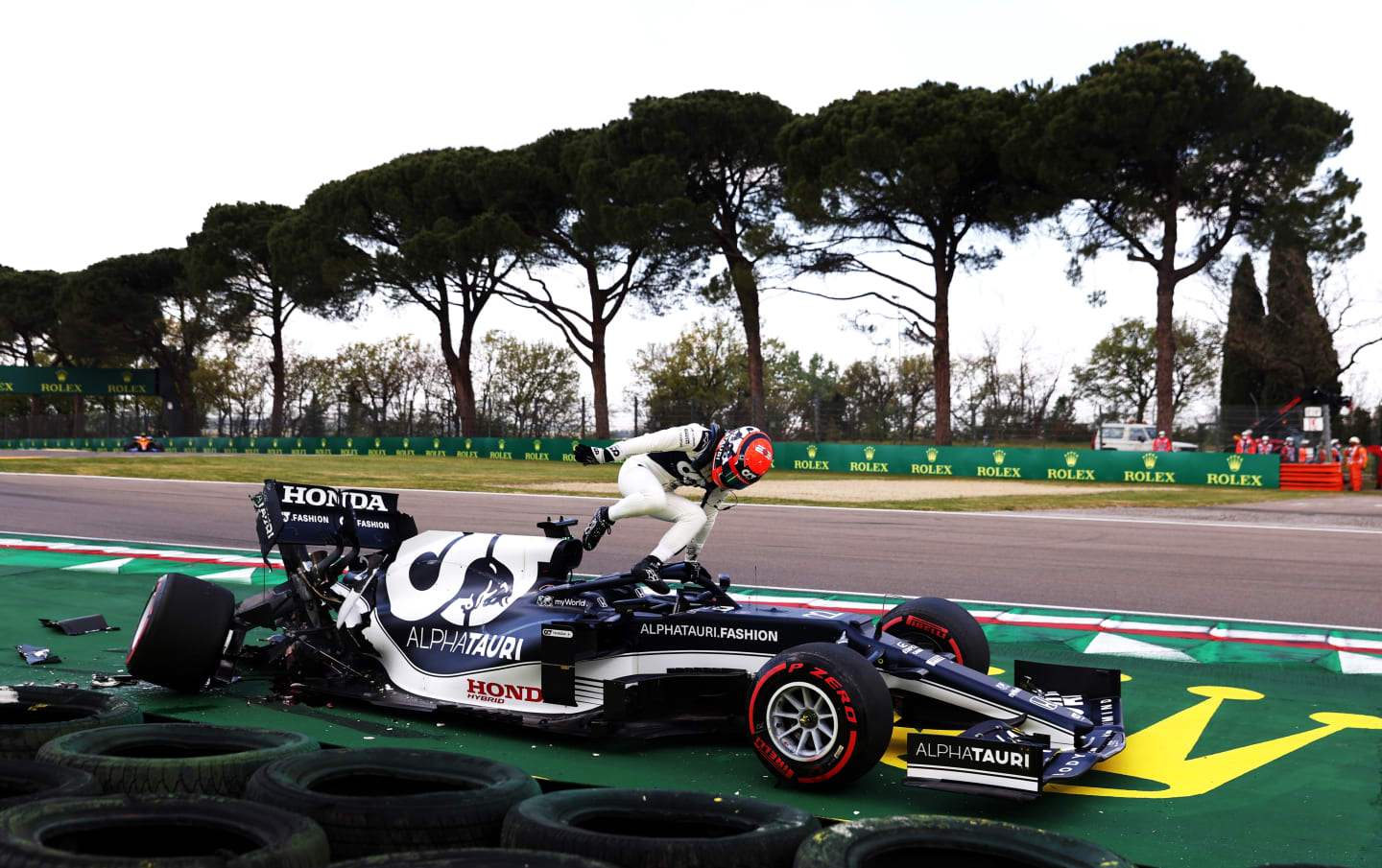 IMOLA, ITALY - APRIL 17: Yuki Tsunoda of Japan and Scuderia AlphaTauri climbs out of his car after