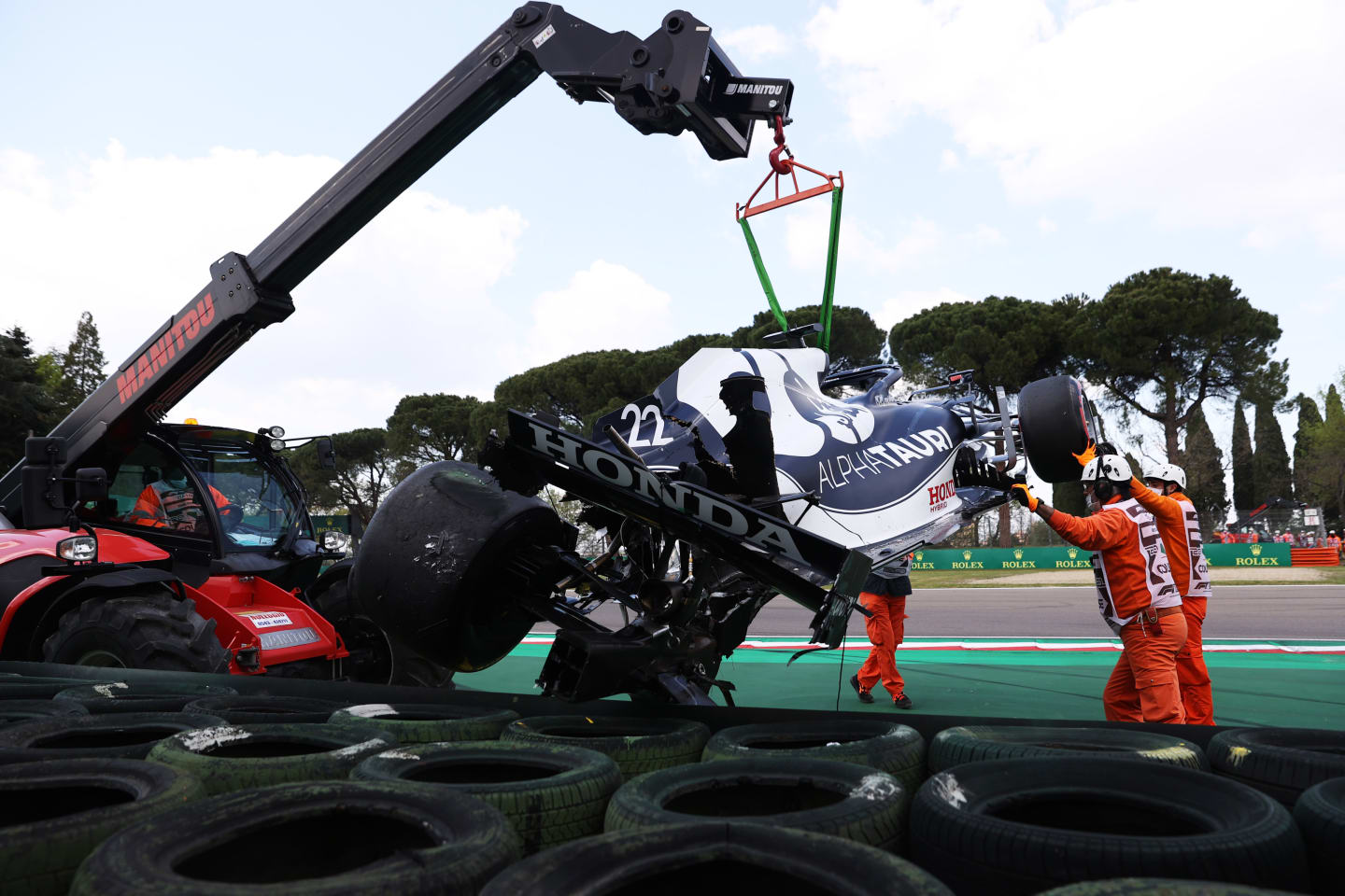 IMOLA, ITALY - APRIL 17: The car of Yuki Tsunoda of Japan and Scuderia AlphaTauri is removed from the circuit after crashing on track during qualifying ahead of the F1 Grand Prix of Emilia Romagna at Autodromo Enzo e Dino Ferrari on April 17, 2021 in Imola, Italy. (Photo by Lars Baron/Getty Images)