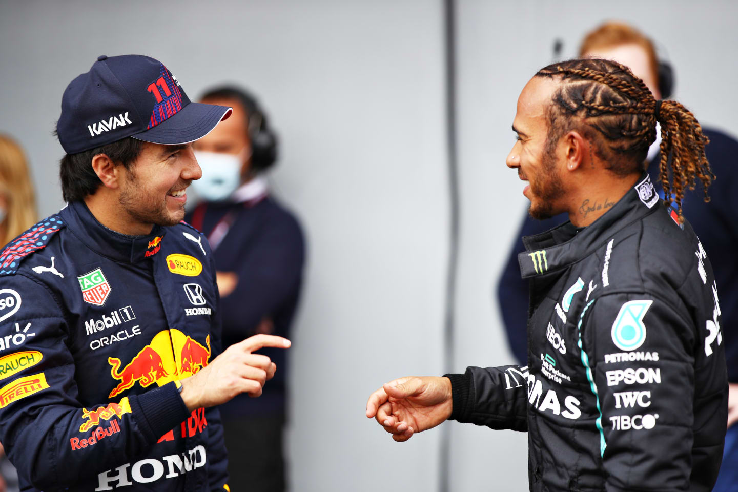 IMOLA, ITALY - APRIL 17: Second place qualifier Sergio Perez of Mexico and Red Bull Racing and pole position qualifier Lewis Hamilton of Great Britain and Mercedes GP talk in parc ferme during qualifying ahead of the F1 Grand Prix of Emilia Romagna at Autodromo Enzo e Dino Ferrari on April 17, 2021 in Imola, Italy. (Photo by Mark Thompson/Getty Images)