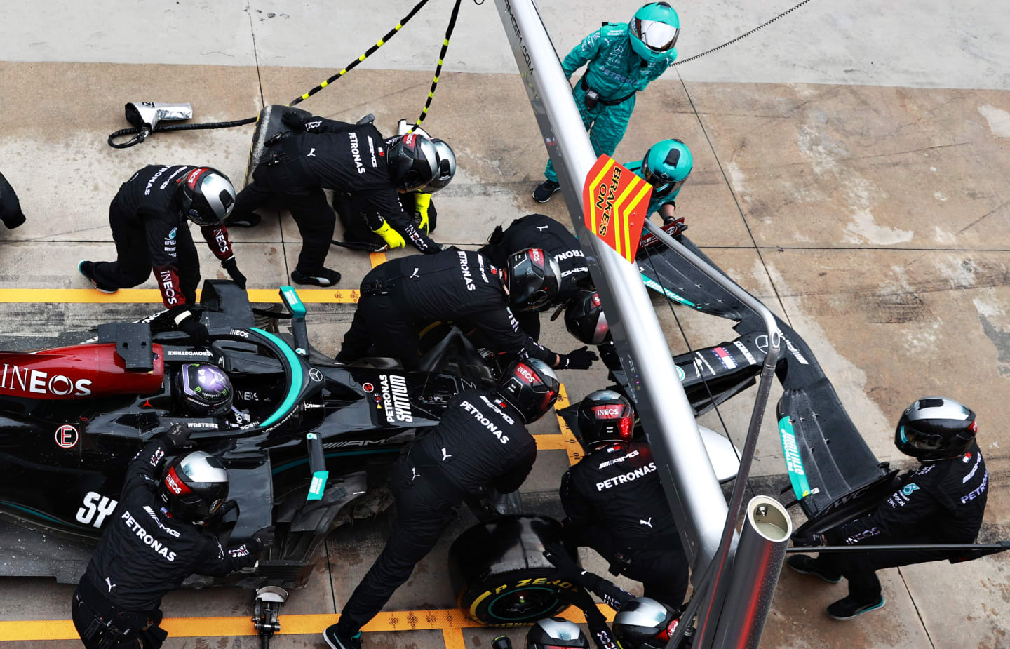 IMOLA, ITALY - APRIL 18: Lewis Hamilton of Great Britain driving the (44) Mercedes AMG Petronas F1 Team Mercedes W12 makes a pitstop for a new front wing following a crash during the F1 Grand Prix of Emilia Romagna at Autodromo Enzo e Dino Ferrari on April 18, 2021 in Imola, Italy. (Photo by Mark Thompson/Getty Images)