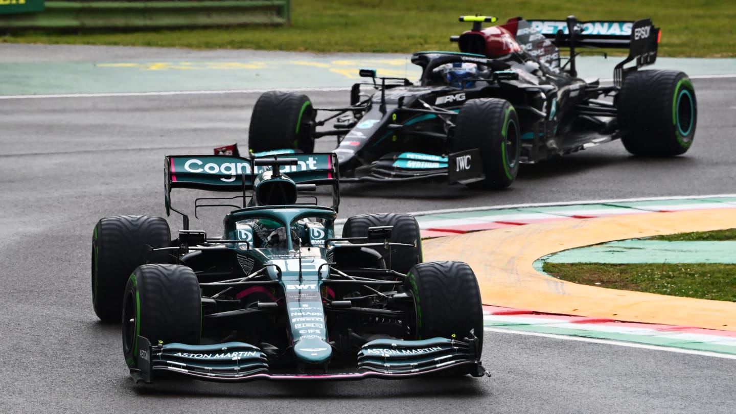 IMOLA, ITALY - APRIL 18: Lance Stroll of Canada driving the (18) Aston Martin AMR21 Mercedes leads