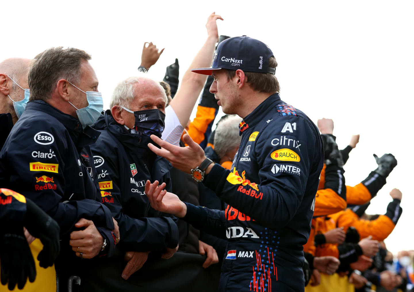 IMOLA, ITALY - APRIL 18: Race winner Max Verstappen of Netherlands and Red Bull Racing talks with Red Bull Racing Team Principal Christian Horner and Red Bull Racing Team Consultant Dr Helmut Marko in parc ferme after the F1 Grand Prix of Emilia Romagna at Autodromo Enzo e Dino Ferrari on April 18, 2021 in Imola, Italy. (Photo by Bryn Lennon/Getty Images)