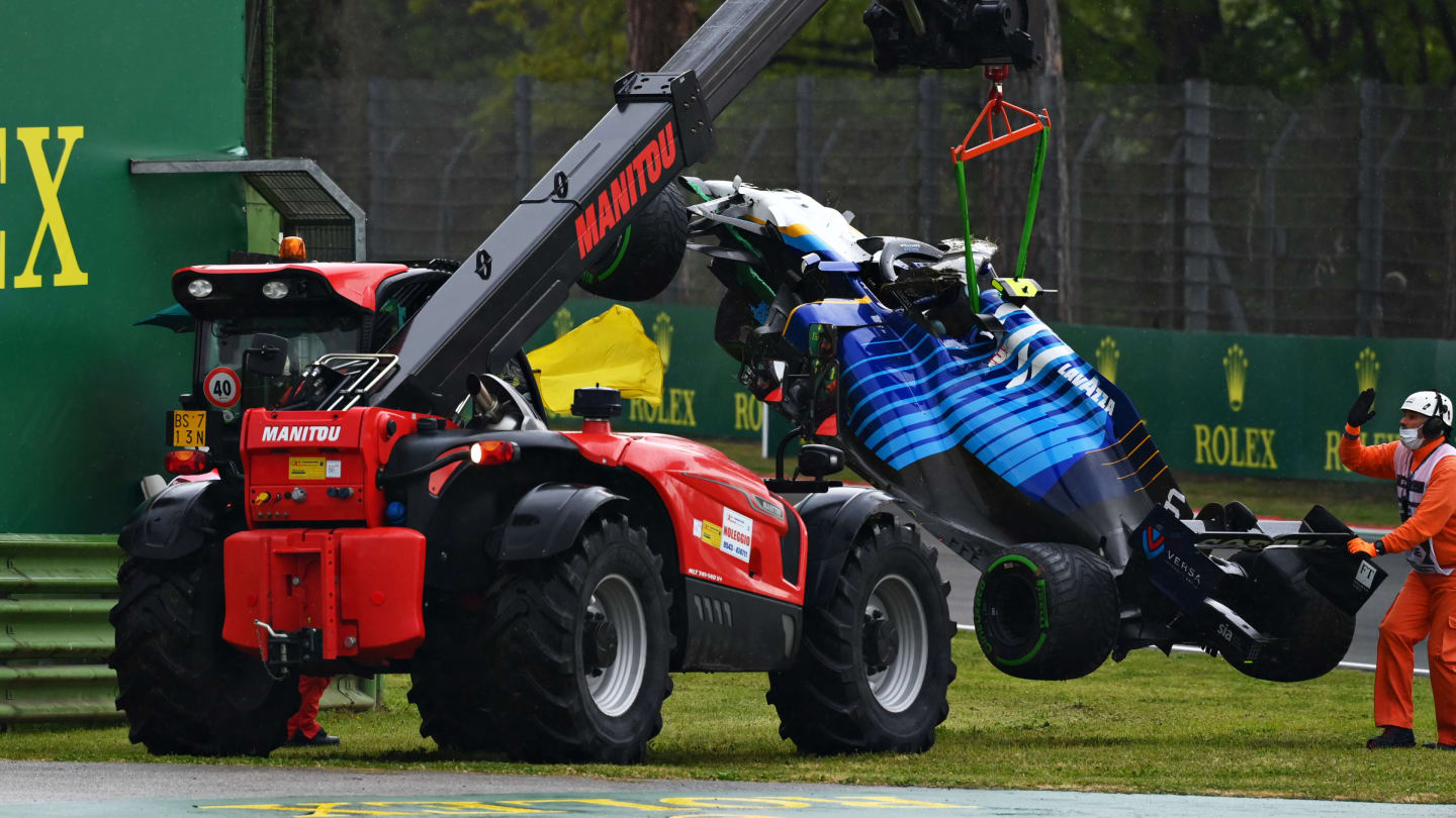 IMOLA, ITALY - APRIL 18: The car of Nicholas Latifi of Canada and Williams is removed from the circuit after a crash during the F1 Grand Prix of Emilia Romagna at Autodromo Enzo e Dino Ferrari on April 18, 2021 in Imola, Italy. (Photo by Clive Mason - Formula 1/Formula 1 via Getty Images)