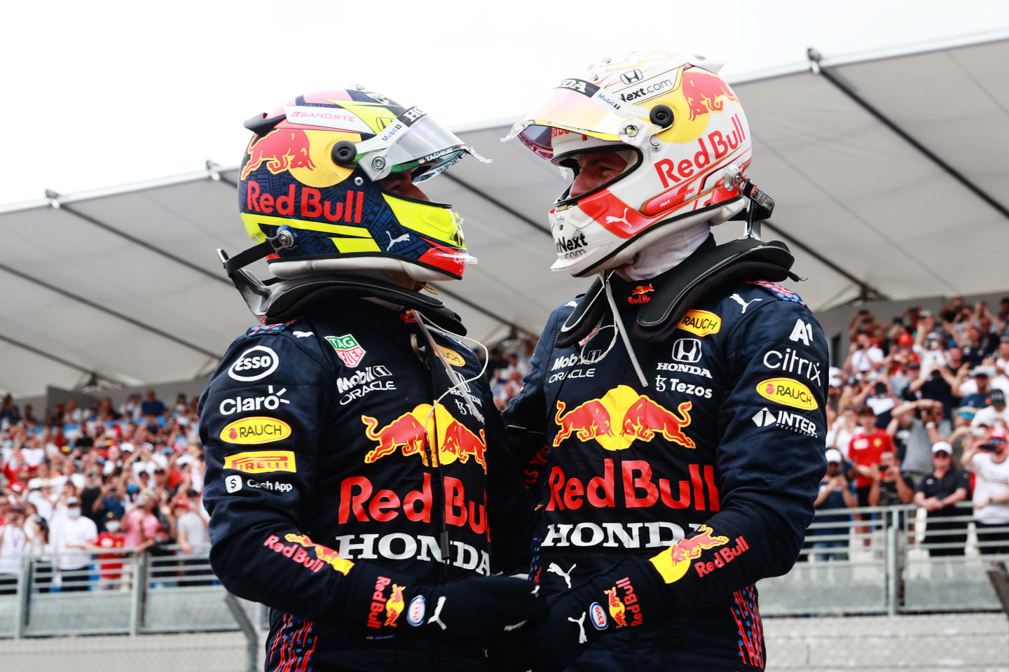 LE CASTELLET, FRANCE - JUNE 20: Race winner Max Verstappen of Netherlands and Red Bull Racing and third placed Sergio Perez of Mexico and Red Bull Racing celebrate in parc ferme during the F1 Grand Prix of France at Circuit Paul Ricard on June 20, 2021 in Le Castellet, France. (Photo by Mark Thompson/Getty Images)
