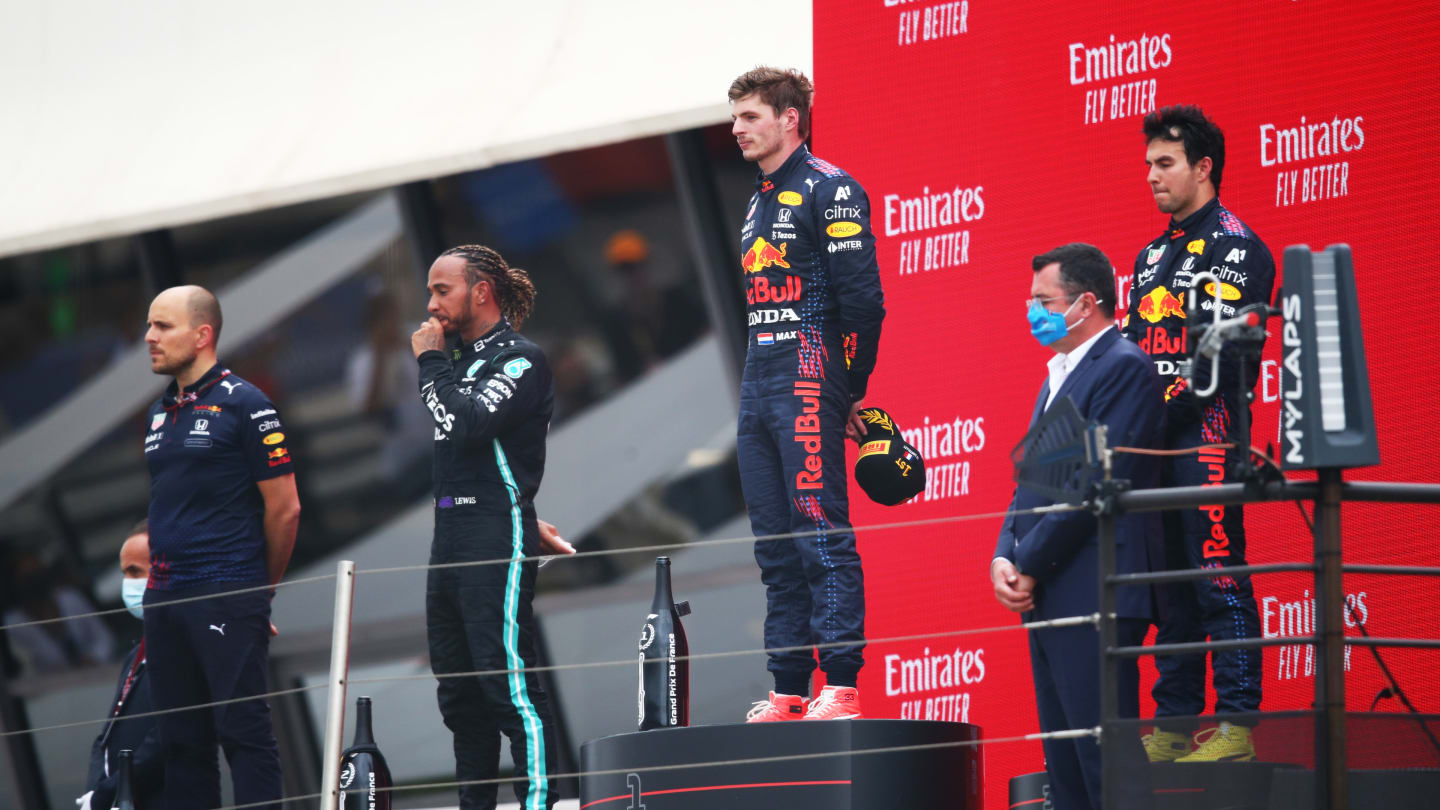 LE CASTELLET, FRANCE - JUNE 20: Second placed Lewis Hamilton of Great Britain and Mercedes GP, race winner Max Verstappen of Netherlands and Red Bull Racing and third placed Sergio Perez of Mexico and Red Bull Racing stand on the podium during the F1 Grand Prix of France at Circuit Paul Ricard on June 20, 2021 in Le Castellet, France. (Photo by Joe Portlock - Formula 1/Formula 1 via Getty Images)