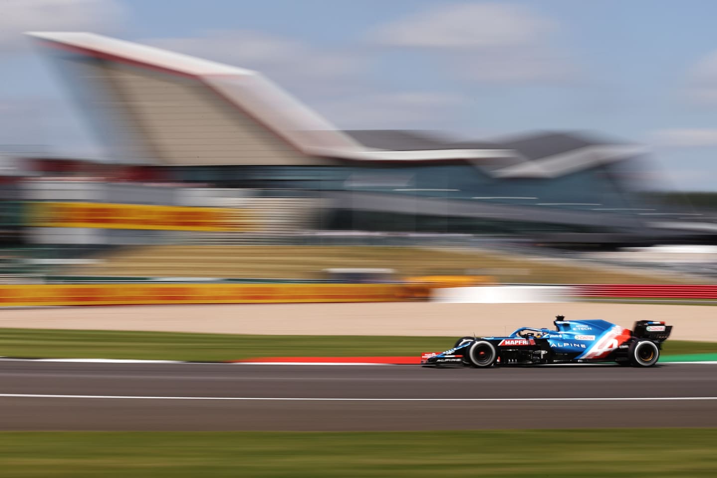 NORTHAMPTON, ENGLAND - JULY 16: Fernando Alonso of Spain driving the (14) Alpine A521 Renault during practice ahead of the F1 Grand Prix of Great Britain at Silverstone on July 16, 2021 in Northampton, England. (Photo by Lars Baron/Getty Images)