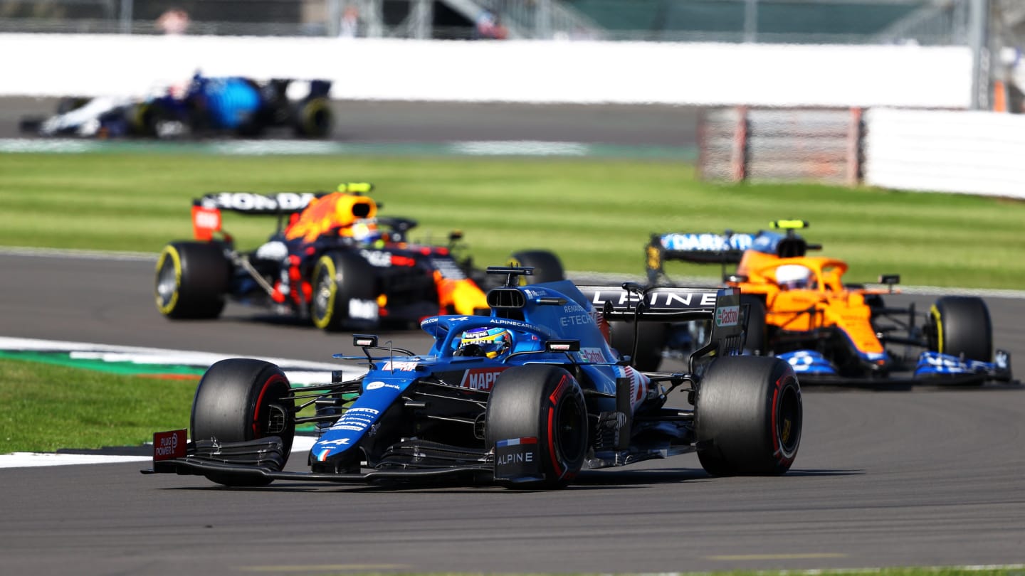 NORTHAMPTON, ENGLAND - JULY 17: Fernando Alonso of Spain driving the (14) Alpine A521 Renault leads