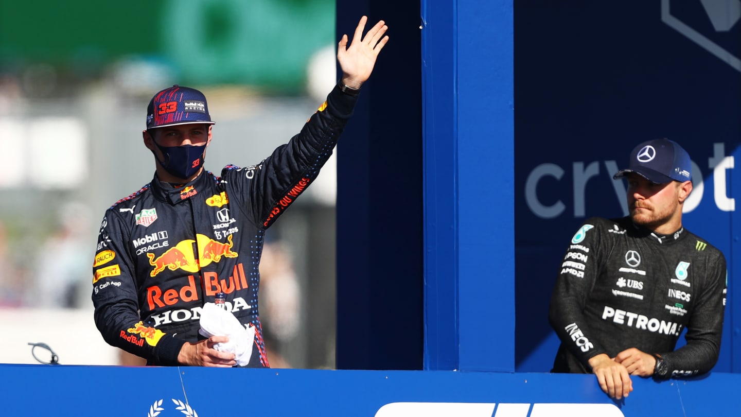 NORTHAMPTON, ENGLAND - JULY 17: Winner Max Verstappen of Netherlands and Red Bull Racing waves to the crowd on the Victory Lap during the Sprint for the F1 Grand Prix of Great Britain at Silverstone on July 17, 2021 in Northampton, England. (Photo by Bryn Lennon - Formula 1/Formula 1 via Getty Images)