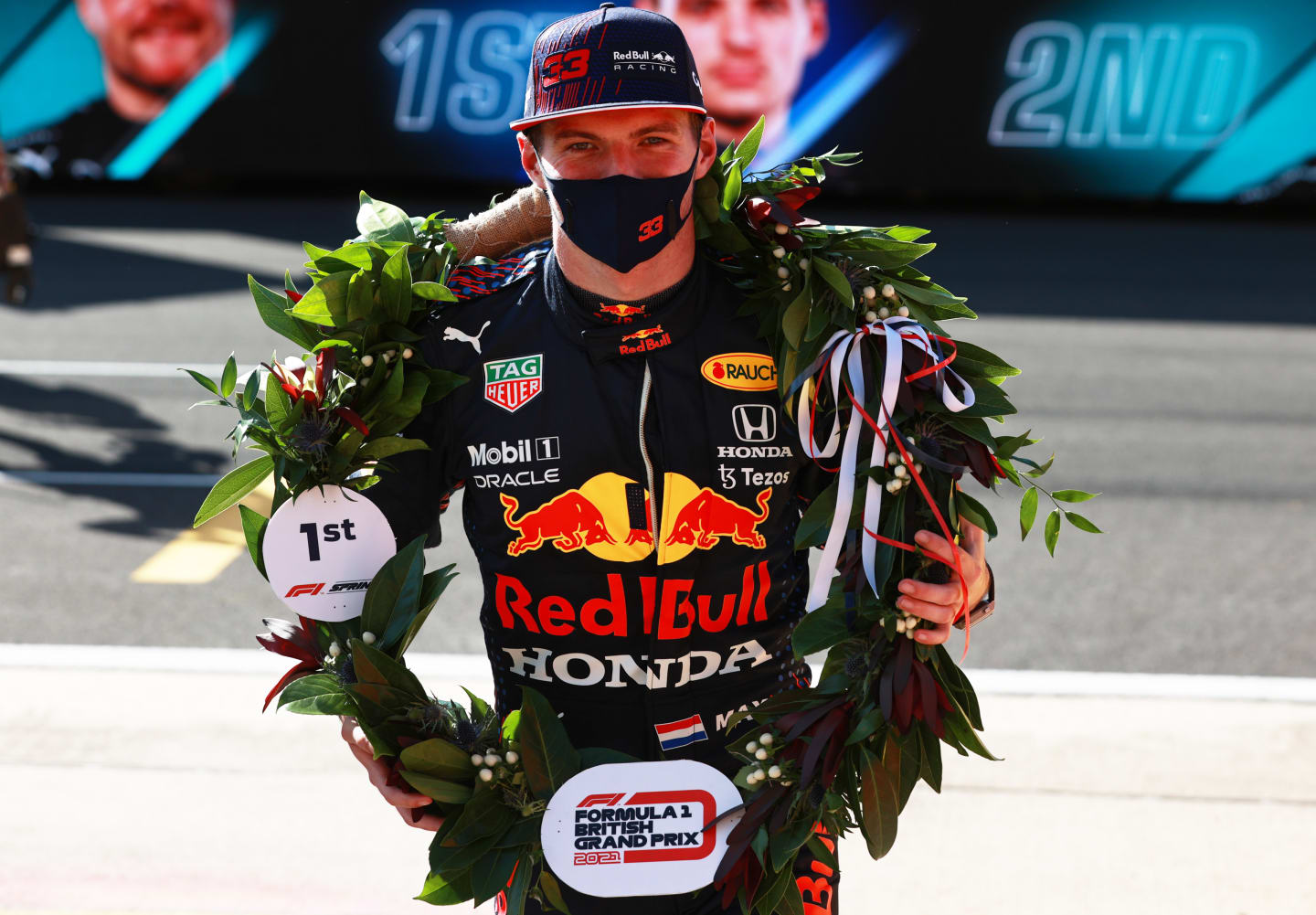 NORTHAMPTON, ENGLAND - JULY 17: Winner Max Verstappen of Netherlands and Red Bull Racing celebrates in parc ferme during the Sprint for the F1 Grand Prix of Great Britain at Silverstone on July 17, 2021 in Northampton, England. (Photo by Mark Thompson/Getty Images)